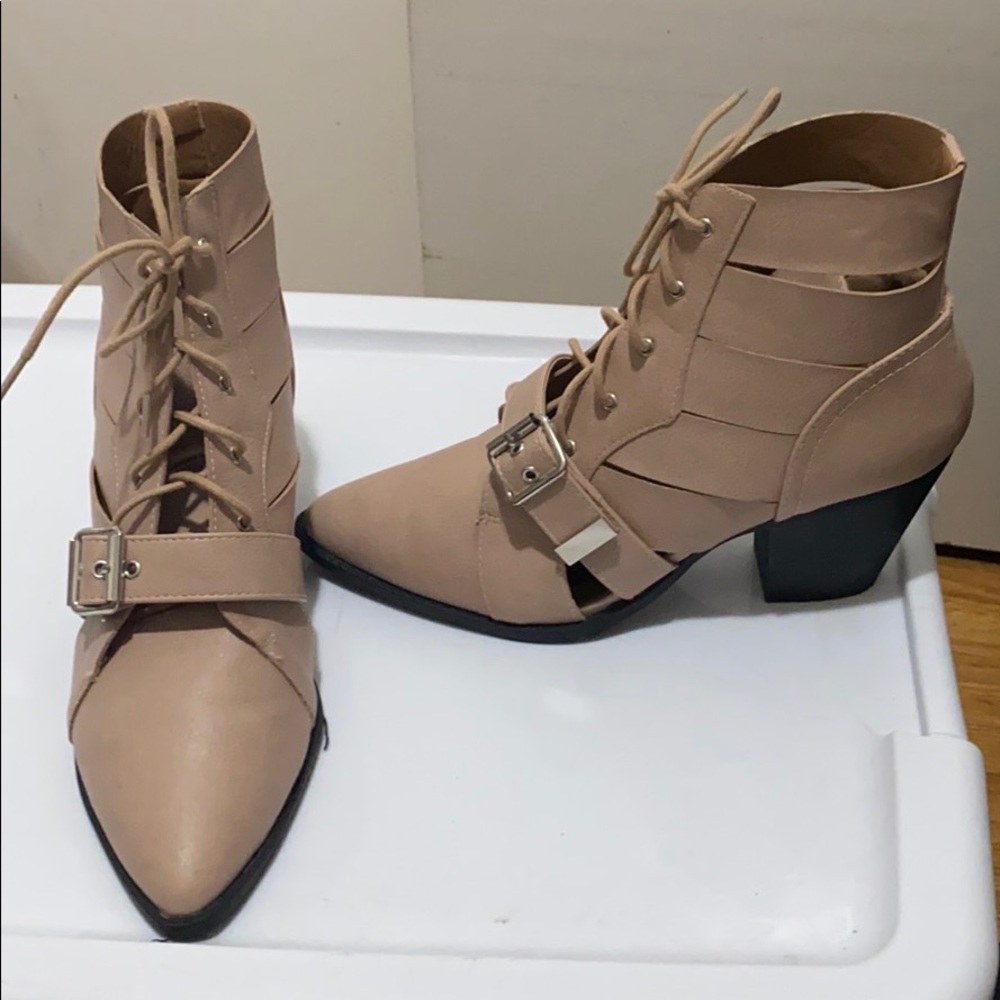 Pointed toe cut out lace up heeled bootie